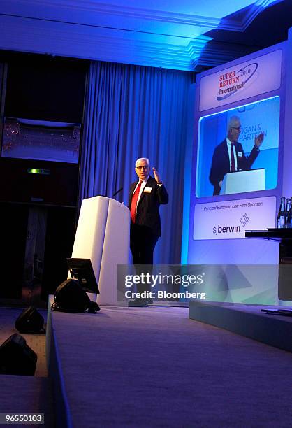David Rubenstein, founder & managing director of the Carlyle Group, gestures while speaking at the Super Return International 2010 conference in...