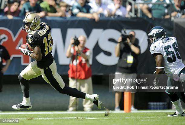 Marques Colston of the New Orleans Saints runs with the ball against the Philadelphia Eagles at Lincoln Financial Field in Philadelphia, Pennsylvania...