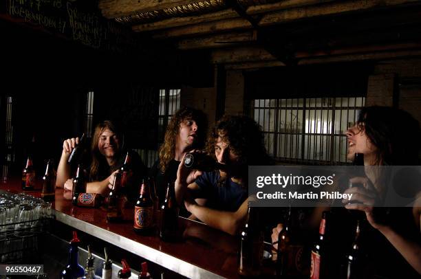 Justin Street, David Roads, Joel O'Keeffe and Ryan O'Keeffe of Airbourne pose for a group portrait on 2nd November 2006 in Melbourne, Australia.