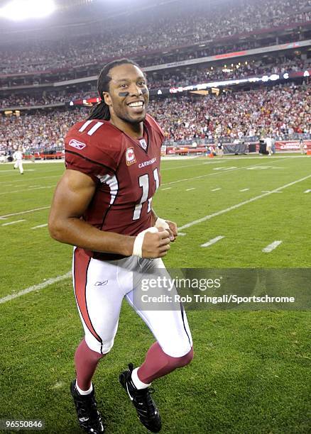 Larry Fitzgerald of the Arizona Cardinals celebrates after defeating the Green Bay Packers in the NFC wild-card playoff game at University of Phoenix...