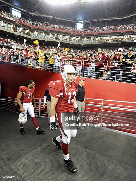 Kurt Warner of the Arizona Cardinals before being introduced to the crowd before a game against the Green Bay Packers in the NFC wild-card playoff...