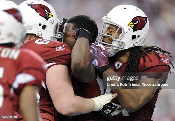 Larry Fitzgerald of the Arizona Cardinals reacts against the Green Bay Packers in the NFC wild-card playoff game at University of Phoenix Stadium on...