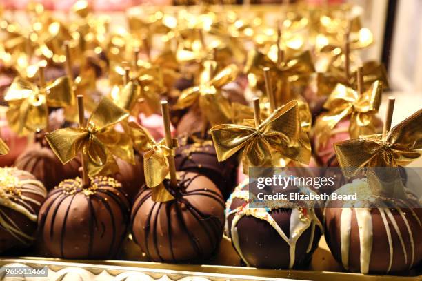 chocolate cake pops for sale at hamburg christmas market - cake sale stock-fotos und bilder