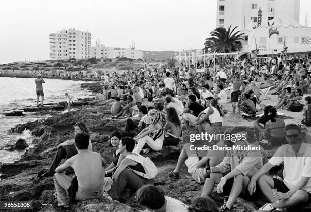 Crowd gathered to watch the sunset in front of Cafe del Mar, in San Antonio, Ibiza, on August 29, 2001. Ibiza is a top holiday destination for young...