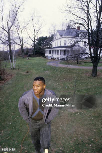 Casual portrait of Mike Tyson outside of the home of his surrogate mother Camille Ewald. Catskill, NY 12/1/1985 CREDIT: Manny Millan