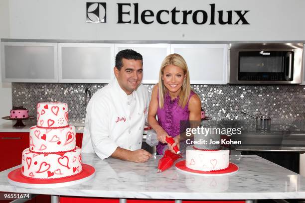 Personality Kelly Ripa and chef Buddy Valastro attend Kelly's Cake Off For a Cause at Chelsea Market on February 9, 2010 in New York City.