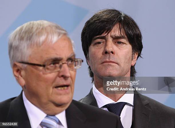 Head coach Joachim Loew of the German football national team looks to Theo Zwanziger, president of the German Football Association at Chancellery on...