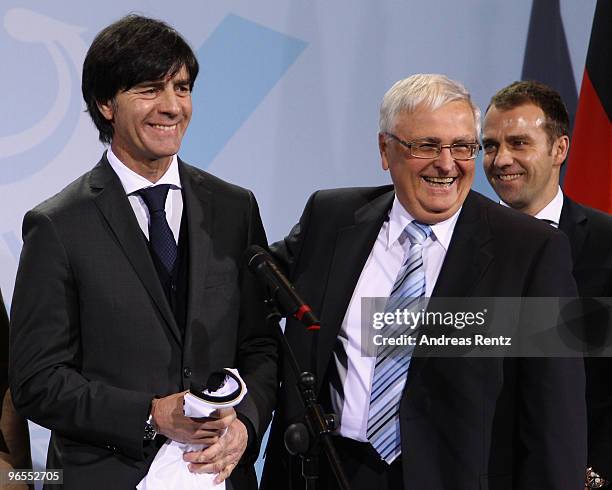 Head coach Joachim Loew of the German football national team and Theo Zwanziger , president of the German Football Association , smile at Chancellery...