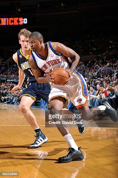 Jonathan Bender of the New York Knicks moves the ball against Mike Dunleavy of the Indiana Pacers during the game on January 3, 2010 at Madison...