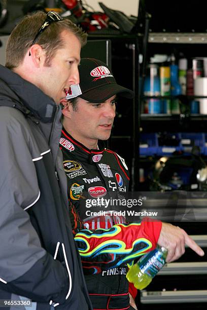 Alan Gustafson , crew chief for Mark Martin ,, driver of the GoDaddy.com Chevrolet, and Jeff Gordon, driver of the DuPont Chevrolet, talk in the...