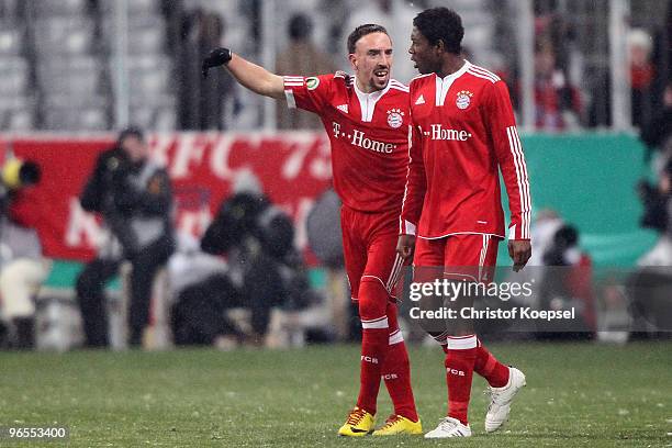 Franck Ribery of Bayern celebrates the third goal with David Alaba during the DFB Cup quarter final match between FC Bayern Muenchen and SpVgg...