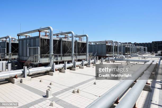 sets of cooling towers for datacenter - wind stock photos et images de collection