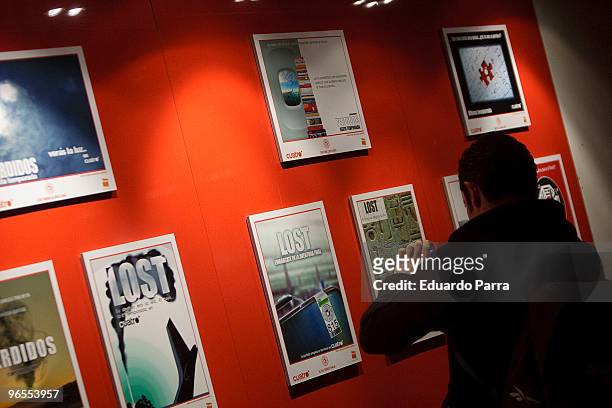 Visitors take a look at objects from the TV series 'Lost' at the 'Lost' exhibition opening at Callao Fnac Forum on February 10, 2010 in Madrid,...