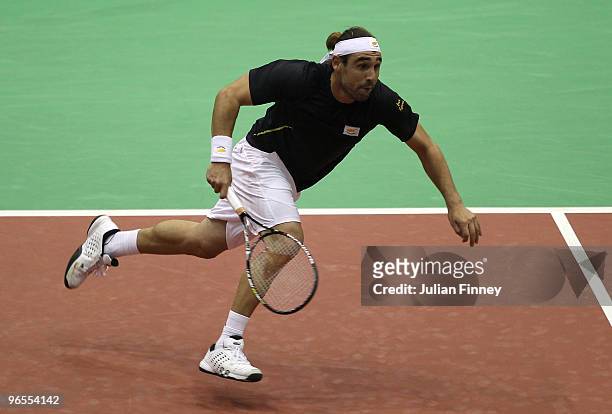 Marcos Baghdatis of Cyprus in action against James Blake of USA during day three of the ABN AMBRO World Tennis Tournament on February 10, 2010 in...