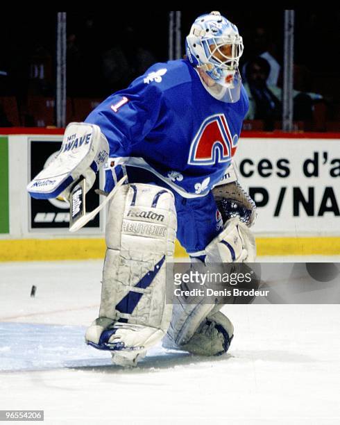 Goaltender Garth Snow of the Quebec Nordiques protects the net against the Montreal Canadiens in the early-1990's at the Montreal Forum in Montreal,...