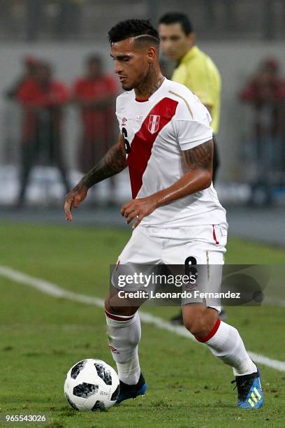 Miguel Trauco of Peru controls the ball during the international friendly match between Peru and Scotland at Estadio Nacional de Lima on May 29, 2018...