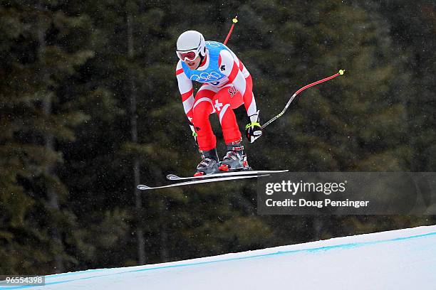 Ambrosi Hoffmann of Switzerland practices during the Men's Downhill skiing 1st training run ahead of the Vancouver 2010 Winter Olympics on February...