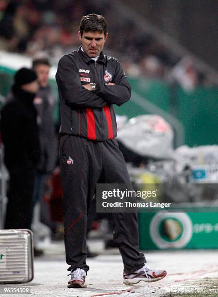 Head coach Zvonimir Soldo of Cologne looks dejected after the DFB Cup quarterfinal match between FC Augsburg and FC Koeln at the Impuls Arena on...