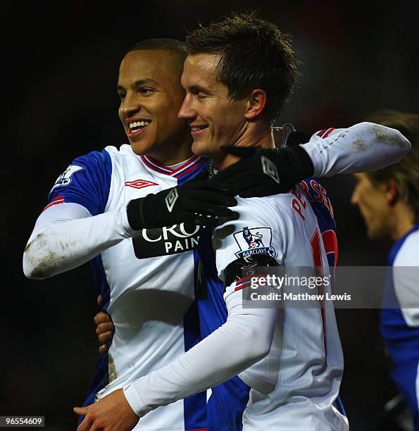 Martin Olsson of Blackburn Rovers celebrates his goal with Morten Gamst Pedersen during the Barclays Premier League match between Blackburn Rovers...