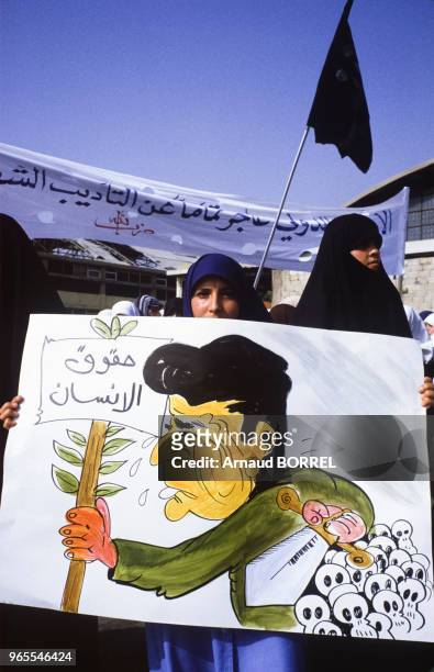 Caricature anti Reagan sur une banderole dans une manifestation chiite lors du détournement d'un avion de la TWA attribué au Hezbollah le 21 juin...