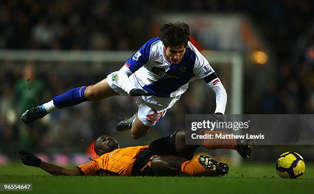 Nikola Kalinic of Blackburn Rovers is tackled by George Boateng of Hull during the Barclays Premier League match between Blackburn Rovers and Hull...