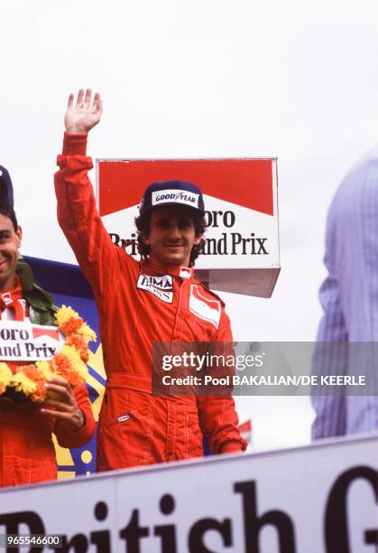 Le pilote Alain Prost vainqueur du Grand Prix automobile sur sa McLaren-TAG le 21 juillet 1985 à Silverstone, Royaume-Uni.