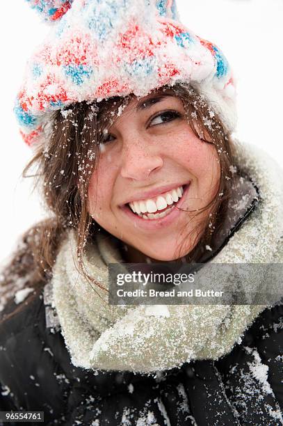 smiling young woman in the snow - manchester vermont fotografías e imágenes de stock