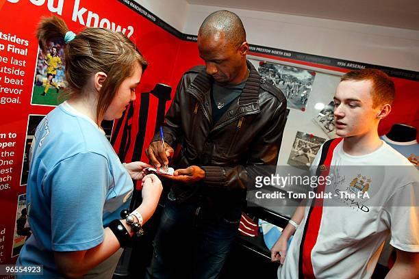 Patrick Vieira signs autographs during the FA Cup Trophy Tour at City of Manchester Stadium on February 10, 2010 in Manchester, England.