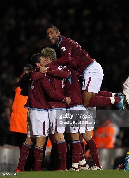 Mido of West Ham United celebrates with Alessandro Diamanti of West Ham United after Alessandro Diamanti scored the first goal for West Ham United...