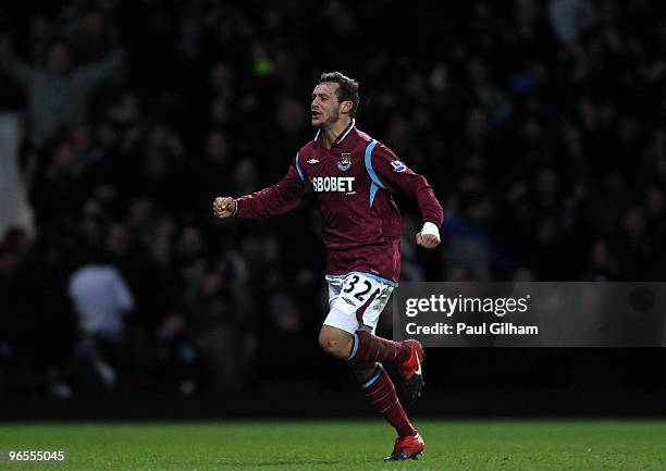 Alessandro Diamanti of West Ham United celebrates scoring the first goal for West Ham United during the Barclays Premier League match between West...