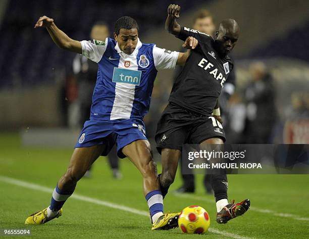 Porto's defender from Uruguay Alvaro Pereira competes with Academica's forward Modou Sougou from Senegal during their Portuguese League Cup...