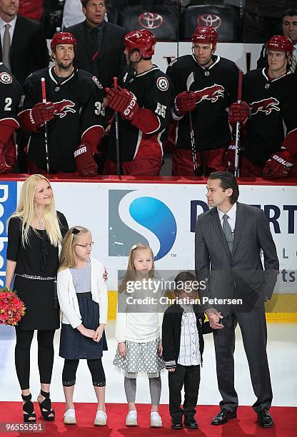 Teppo Numminen stands with his family; wife Ann-Maarit, daughters Bianca and Erica, son Niklas, as Teppo is inducted into the Phoenix Coyotes "Ring...