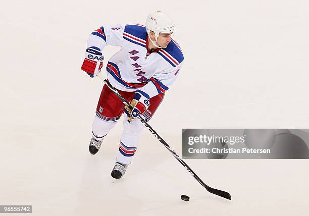 Wade Redden of the New York Rangers skates with the puck during the NHL game against the Phoenix Coyotes at Jobing.com Arena on January 30, 2010 in...