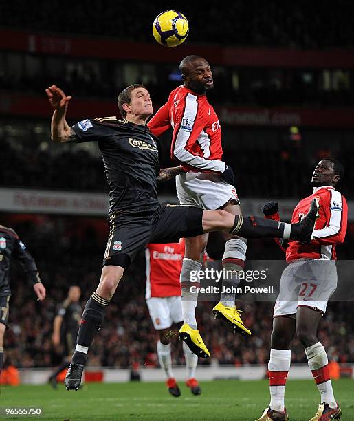 Daniel Agger of Liverpool goes up with William Gallas of Arsenal during the Barclays Premier League match between Arsenal and Liverpool at Emirates...