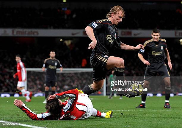 Dirk Kuyt of Liverpool competes with Andrey Arshavin of Arsenal during the Barclays Premier League match between Arsenal and Liverpool at Emirates...