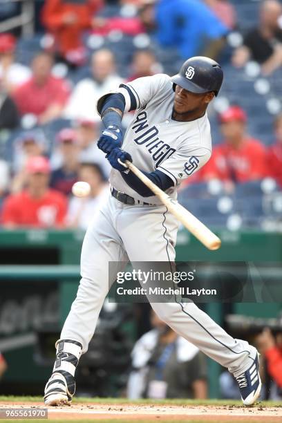 Franchy Cordero of the San Diego Padres takes a swing during a baseball game against the Washington Nationals at Nationals Park on May 22, 2018 in...