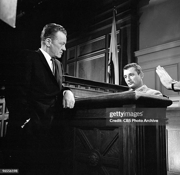 William Talman as Hamilton Burger and Bobby Troup as Bongo White, sitting, perform in a scene from an episode of the TV series "Perry Mason" entitled...