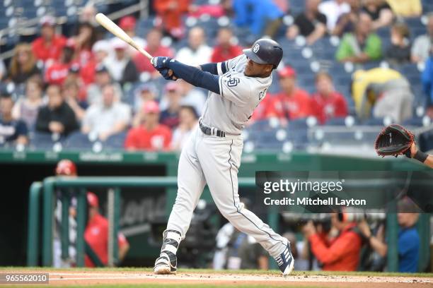 Franchy Cordero of the San Diego Padres takes a swing during a baseball game against the Washington Nationals at Nationals Park on May 22, 2018 in...
