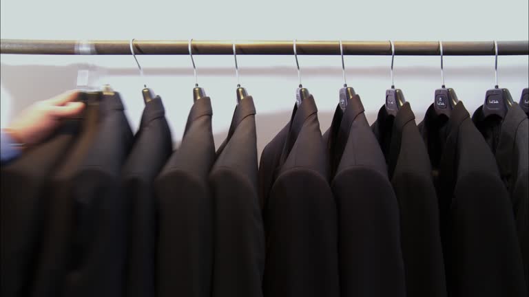 Person Pushing Garment Rack 5,823 Black Jacket Man Stock Videos, Footage, & 4K Video Clips - Getty ...