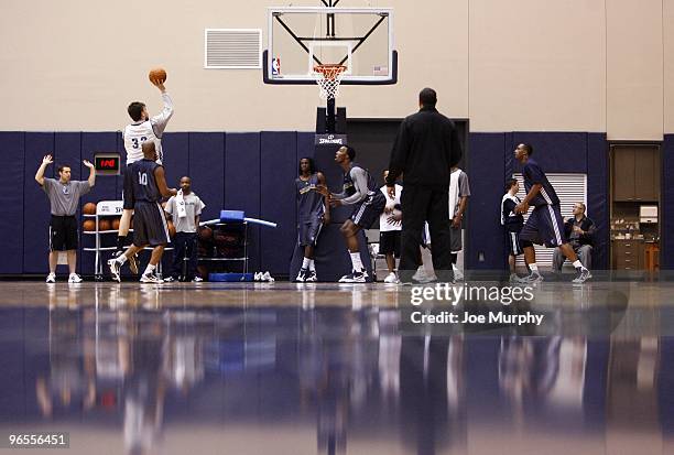 Marc Gasol of the Memphis Grizzlies shoots over Jamal Tinsley of the Memphis Grizzlies during a team practice on February 4, 2010 at FedExForum in...