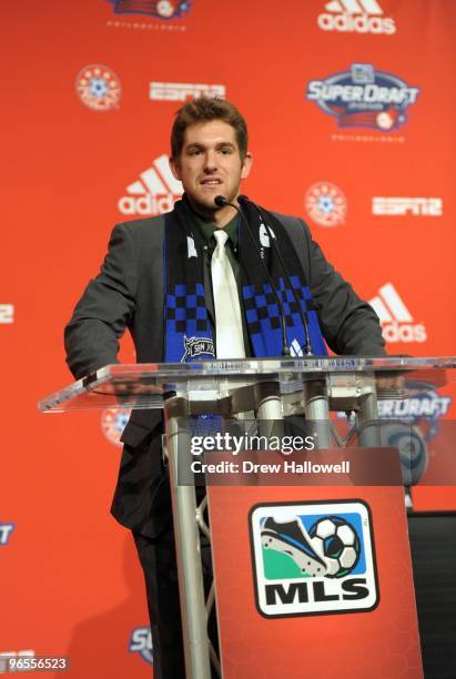 Michael Thomas stands at the podium after being selected by San Jose Earthquakes in the second round during the 2010 MLS SuperDraft on January 14,...