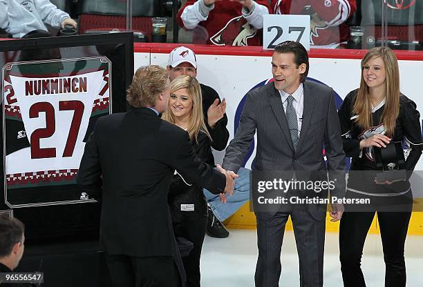 Teppo Numminen is inducted into the Phoenix Coyotes "Ring of Honor" before the NHL game against the New York Rangers at Jobing.com Arena on January...