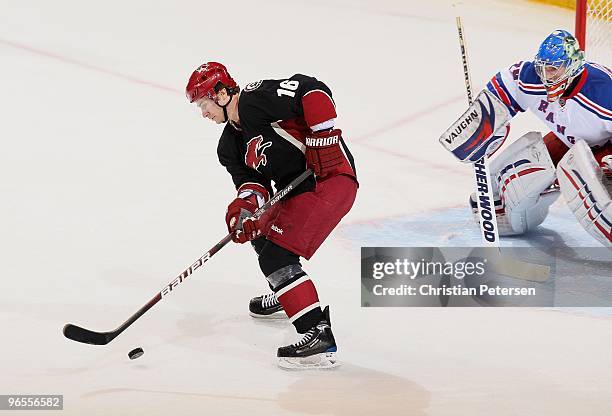 Petr Prucha of the Phoenix Coyotes skates with the puck during the NHL game against the New York Rangers at Jobing.com Arena on January 30, 2010 in...