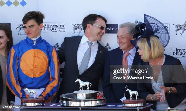 Forever Together Jockey Donnacha O'Brien, Trainer Aidan O'Brien and part owner Derrick Smith celebrate victory of the Investec Oaksduring the...