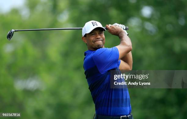 Tiger Woods of the United States watches his tee shot on the third during the second round of The Memorial Tournament Presented by Nationwide at...