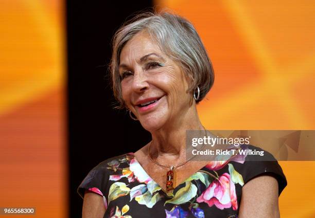 Alice Walton, daughter of Walmart founder Sam Walton, waits onstage during the annual Walmart shareholders meeting event on June 1, 2018 in...