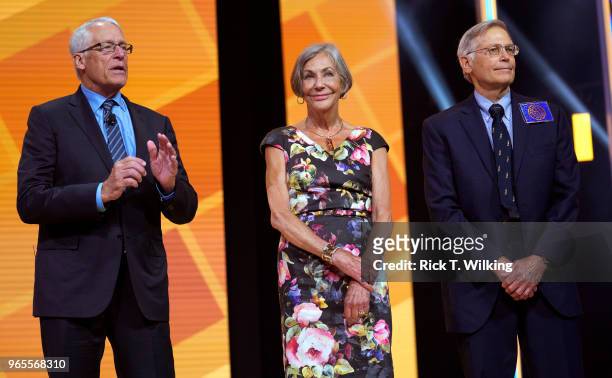 Members of the Walton family Rob, Alice and Jim speak during the annual Walmart shareholders meeting event on June 1, 2018 in Fayetteville, Arkansas....