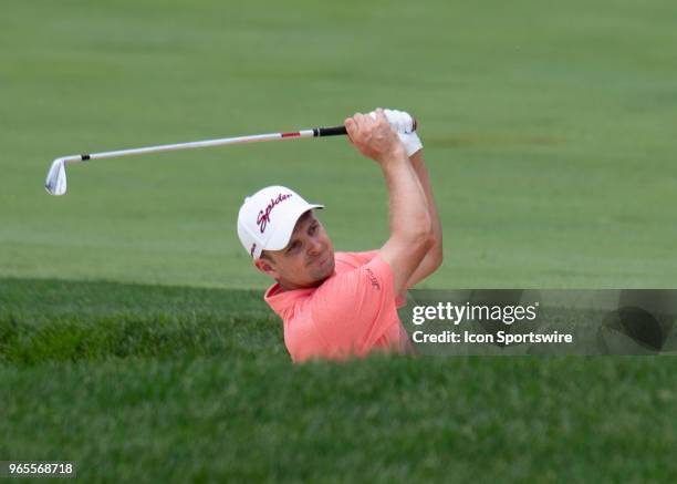 Justin Rose hits out of the bunker during the second round of the Memorial Tournament at Muirfield Village Golf Club in Dublin, Ohio on June 01, 2018.