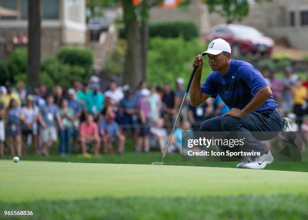 Tiger Woods lines up his putt during the second round of the Memorial Tournament at Muirfield Village Golf Club in Dublin, Ohio on June 01, 2018.
