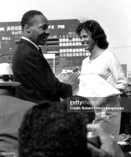 The Reverend Dr. Martin Luther King, Jr. Greets actress Dorothy Dandridge during his first visit to Los Angeles, May 1963. He addressed a crowd of...